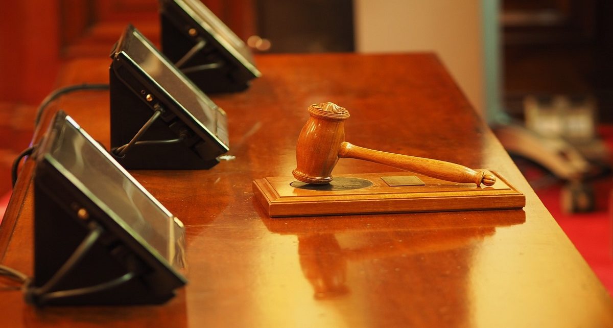 COVID-19, found guilty of disrupting court procedures