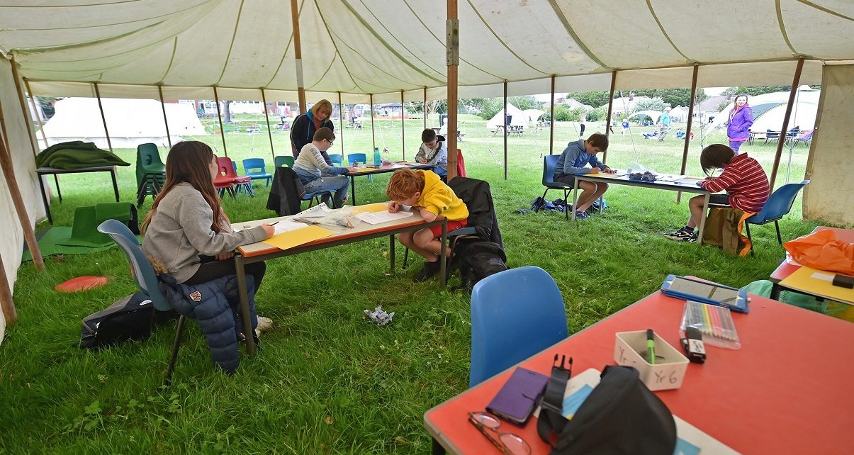 Did New Jersey solve the social distance learning problem using tents?