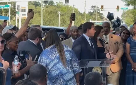 Vigil for Jacksonville Shooting Victims: A Moment of Mourning and Political Tension