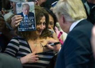 A Recent Iowa Campaign Stop Saw Trump Sign The Cleavage Of A Woman