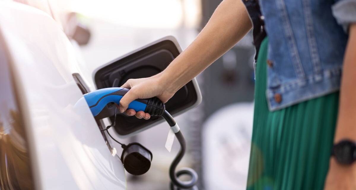 How To Get the Most Out of Your EV Battery’s Lifespan 4 cleanmanagement-341626-woman-pump-charge-Image1