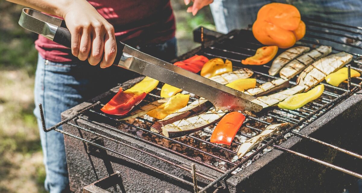 Tips for Healthy Grilling During the Summer 1 SeafoodProducersCooperative-362762-TailgaterMagazine-Person-Grills-Vegetables-image1