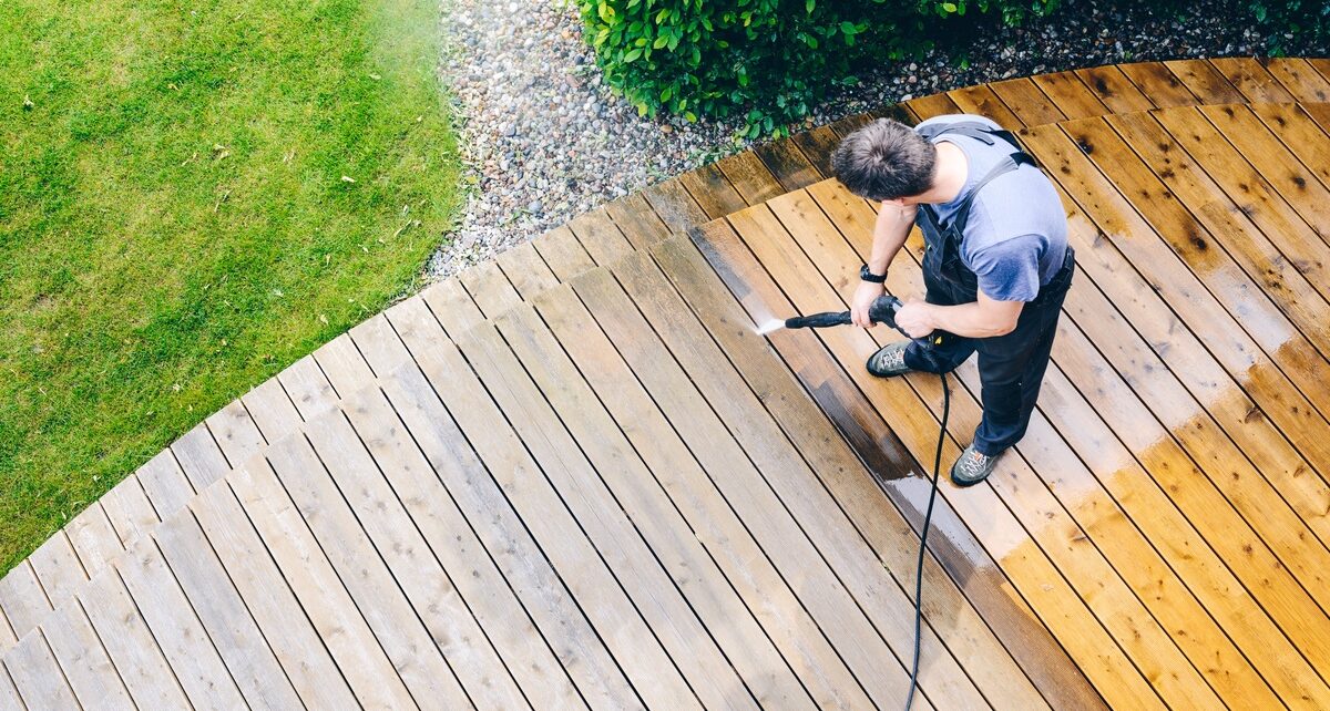 Put Your Pressure Washer to Good Use Around the House 2 Sky's The Limit Car Care - 374498 - person-washing-deck - image1