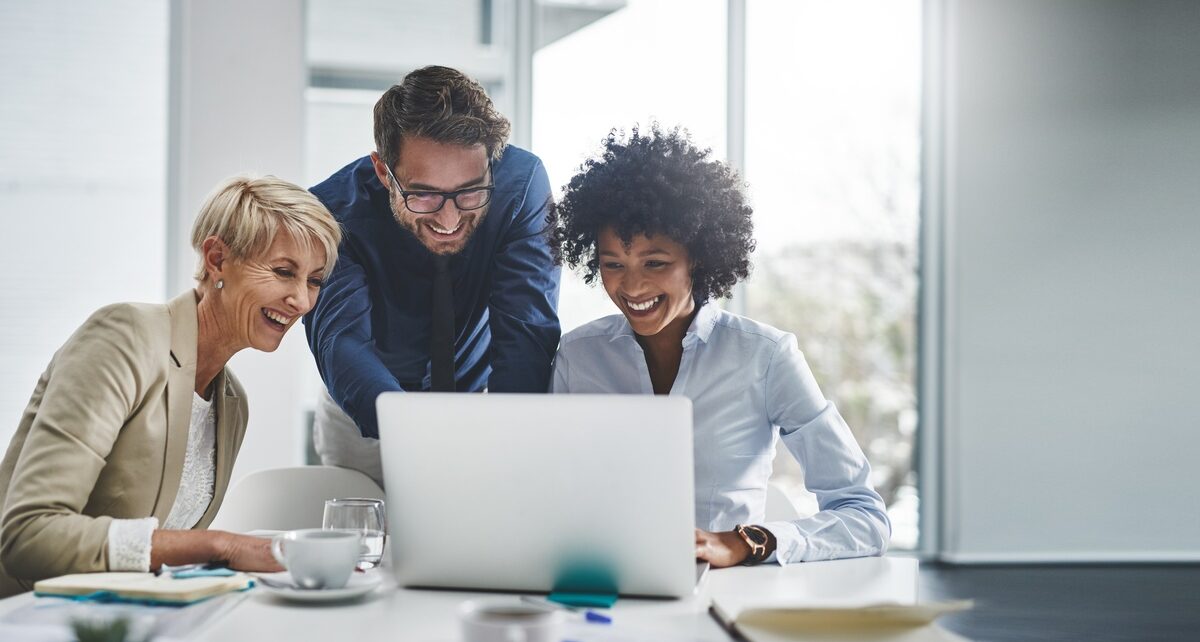 How Tech Literacy Impacts Business Growth 1 WisetekSolutionsInc-375328-group-laptop-office-image1