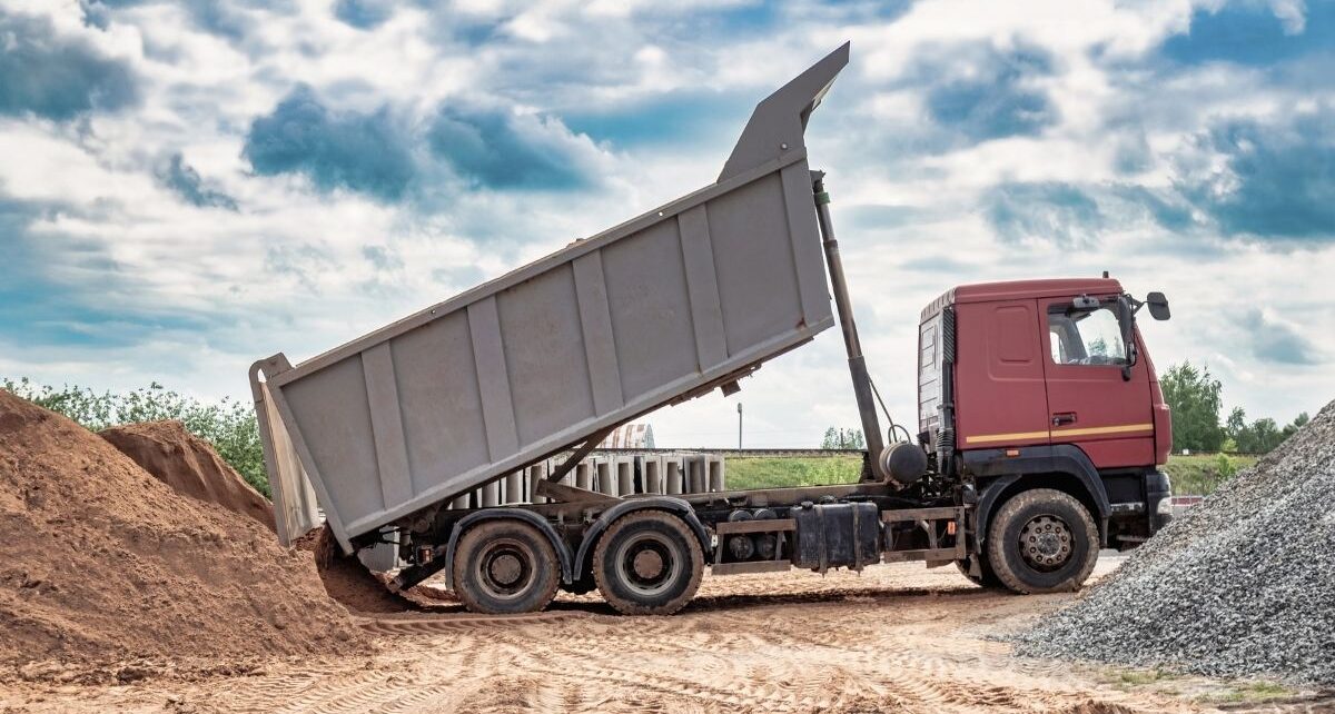 The Cost of Poor Material Release in Commercial Hauling 2 LiningsInc-387334-dump-truck-dirt-image2