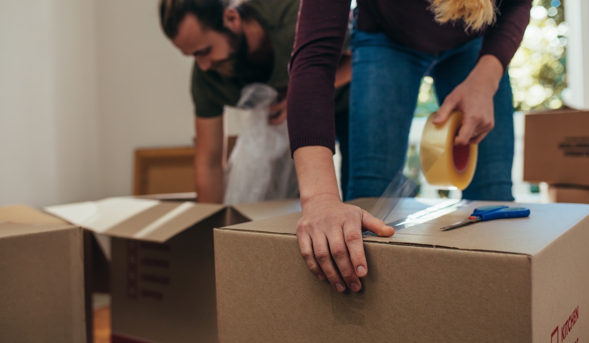 Nevadanorthamerica-408280-woman-taping-box-image1
