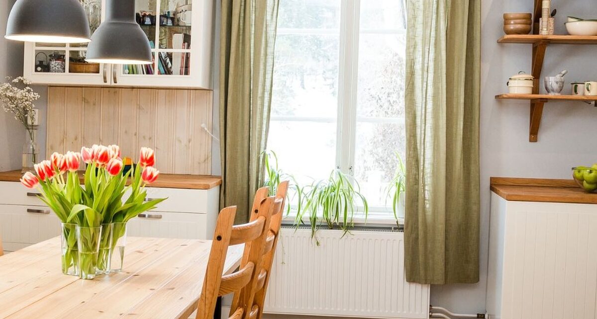 Tips for a Modern, Cozy Kitchen That Supports Slow Living 1 LegacyCabinets-425352-white-cabinets-wood-image-1