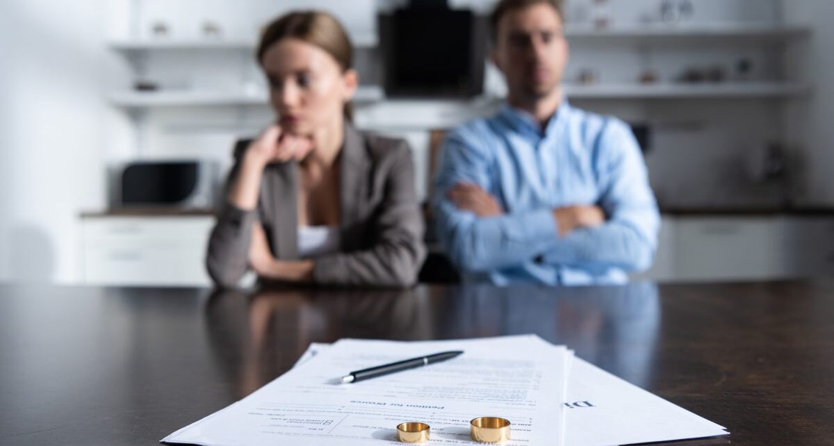 Austin Divorce Checklist To Prepare for the Process 204 Newberrylaw-455810-couple-papers-rings-image1